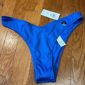 Bikini bottoms, blue in color. New with tags